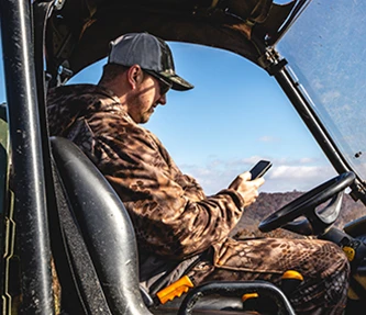 Hunter using HNTCamp from vehicle